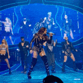 a group of people on a stage with the word rbd3d in the corner