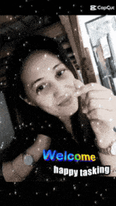a picture of a woman with the words welcome happy tasking below her
