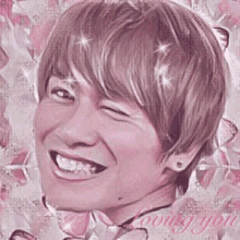 a close up of a man 's face with a pink background and a smile on his face .
