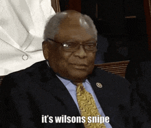 a man in a suit and tie says it 's wilson 's snipe