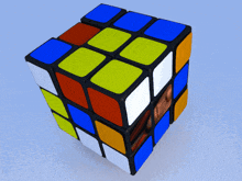 a colorful rubik 's cube with a picture of a man behind it