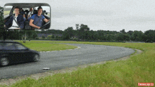 a picture of a car driving down a road with the words think jules on the bottom right