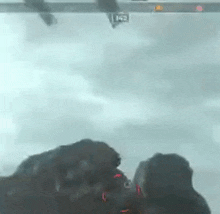 a couple of people standing next to each other in a car .