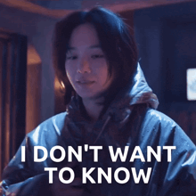 a woman says i don 't want to know while wearing a jacket