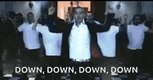 a group of men are standing in a room with their arms outstretched and the words down down down down written on the bottom