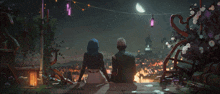 a man and a woman sit on a balcony looking at the moon