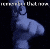 a man wearing glasses is pointing at the camera with the words " remember that now " below him