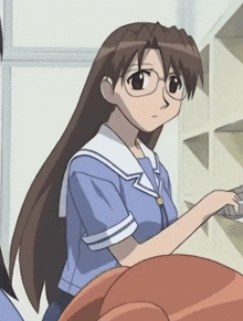 a girl with long brown hair and glasses is standing in front of a shelf