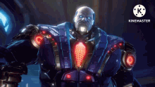 a man in a blue suit with a red tie is standing in front of a screen that says kinemaster .