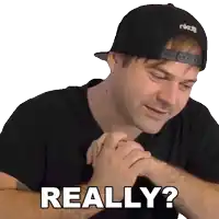 a man wearing a black shirt and a black hat says " really "