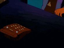 a cartoon otter is talking on a phone and has a triangle necklace around his neck