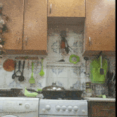 a kitchen with wooden cabinets and a bottle that says latte on it