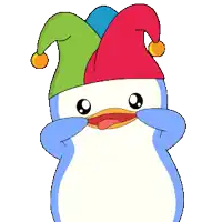 a penguin is wearing a colorful jester hat and sticking its tongue out