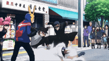 a group of people are fighting in front of a building with chinese writing