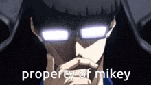 a close up of a person 's face with the words " property of mikey " on the bottom