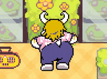a pixel art of a cartoon character with horns dancing in a room .