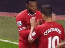 Coutinho GIF - Coutinho Hug Liverpool GIFs
