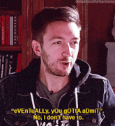 a man in a denim jacket is saying " eventually you gotta admit no i don 't have to "