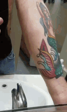 completed tat tattoo mermaid tattoo