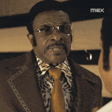 a man in a leopard print suit and tie says are you ready