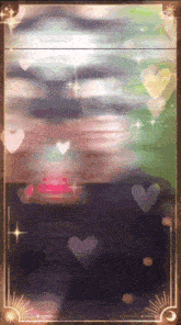 a blurry picture of a person with hearts surrounding them