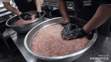 two bowls of meat are on a counter and the words made in animotica are visible