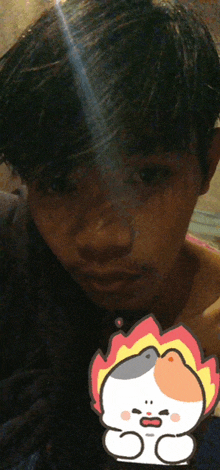a boy with a sticker on his face that says ' o ' on it