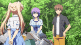 a group of anime characters are standing in a forest