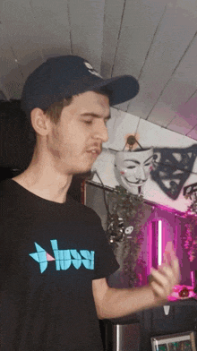 a man wearing a black shirt that says ' boss '