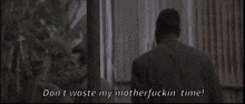 a man in a suit says do n't waste my mother fuckin ' time