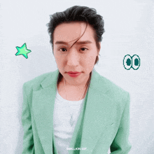a man wearing a green jacket and a white shirt has a star and a number 00 on the bottom