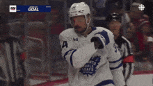 a hockey player with the number 34 on their jersey