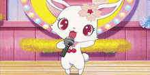 a cartoon rabbit singing into a microphone with a flower on her head