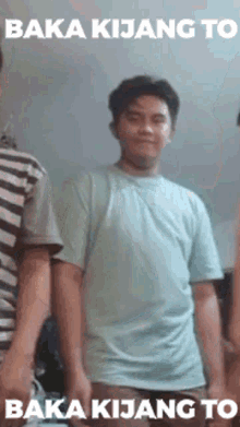 a man in a blue shirt is standing next to two other men and says baka kijang to baka kijang to .