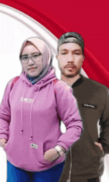 a man and a woman are standing next to each other and the woman is wearing a purple hoodie that says we co