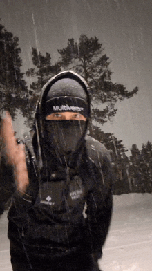 a person wearing a multiverse hat and a black jacket