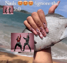 a picture of a hand holding a fish with the words nails ( ignore the lol ) above it