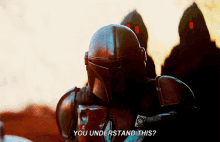 a man in a helmet says you understand this in front of a group of people