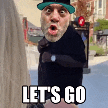 a man with a beard is running with the words let 's go written below him