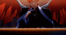 a cartoon character with red hair and wings is sitting in a dark room