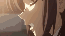 a close up of a girl 's face with her mouth open and her eyes closed