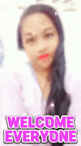a blurred image of a woman with the words welcome everyone