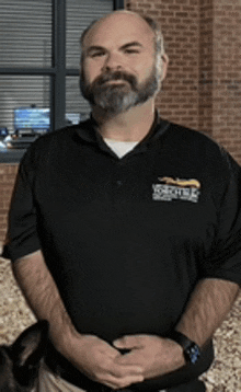 a man with a beard is wearing a black shirt that says yorkdale on it