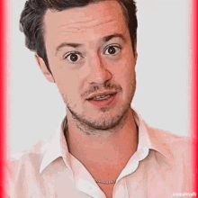 a close up of a man 's face with joequinngifs written on the bottom right corner