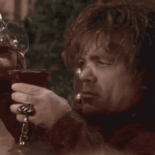 Tyrion Lannister Drink GIF - Tyrion Lannister Drink Pour GIFs