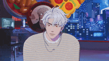 a man in a striped shirt stands in front of a pizza and a sign that says happy birthday