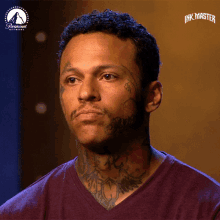 a man with a tattoo on his face is on a show called inkmaster