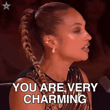 a woman in a braided ponytail is saying you are very charming