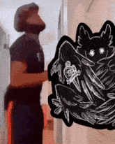 a man standing next to a drawing of a bird with the time 0:00