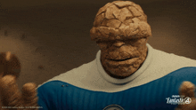 a poster for the movie fantastic four shows the thing giving a thumbs up
